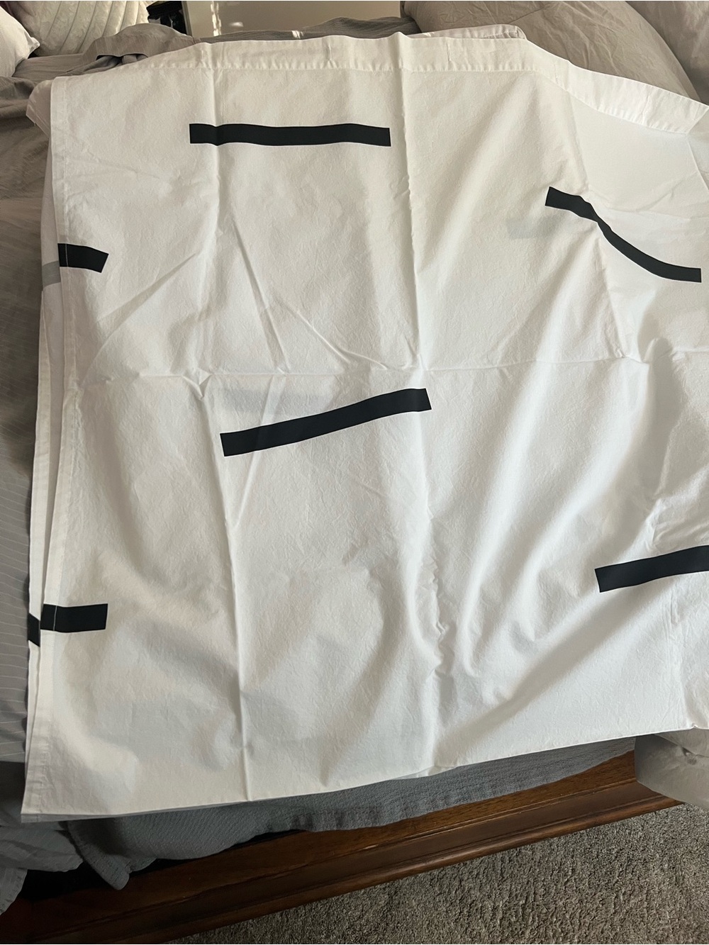 Brooklinen Minimalist White Fabric Shower Curtain with Black Accent Stripes